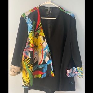 Amazing boutique asymmetric colorful fun jacket.  Add any color under.